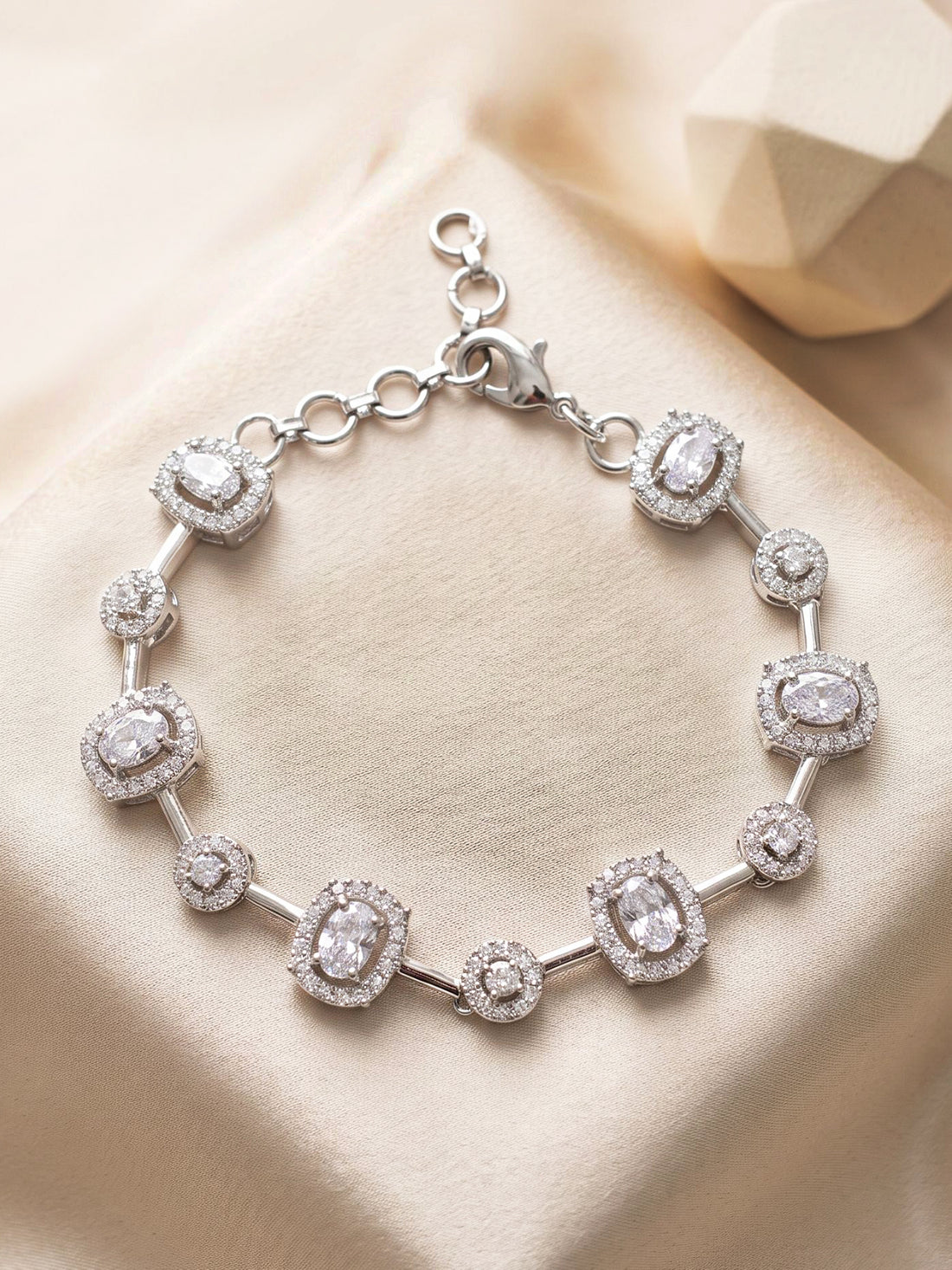 KARATCART Elegant Silver-Toned American Diamond Oval Charm Link Bracelet for Women