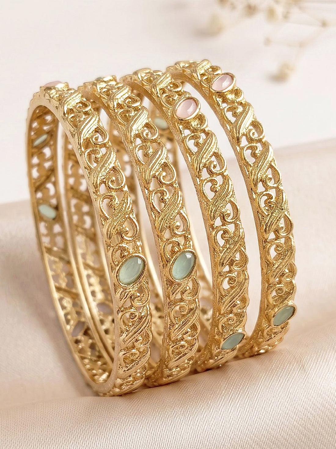KARATCART Set of 4 Gold-Plated Filigree Pink & Green Pastel Stone Bangles for Women