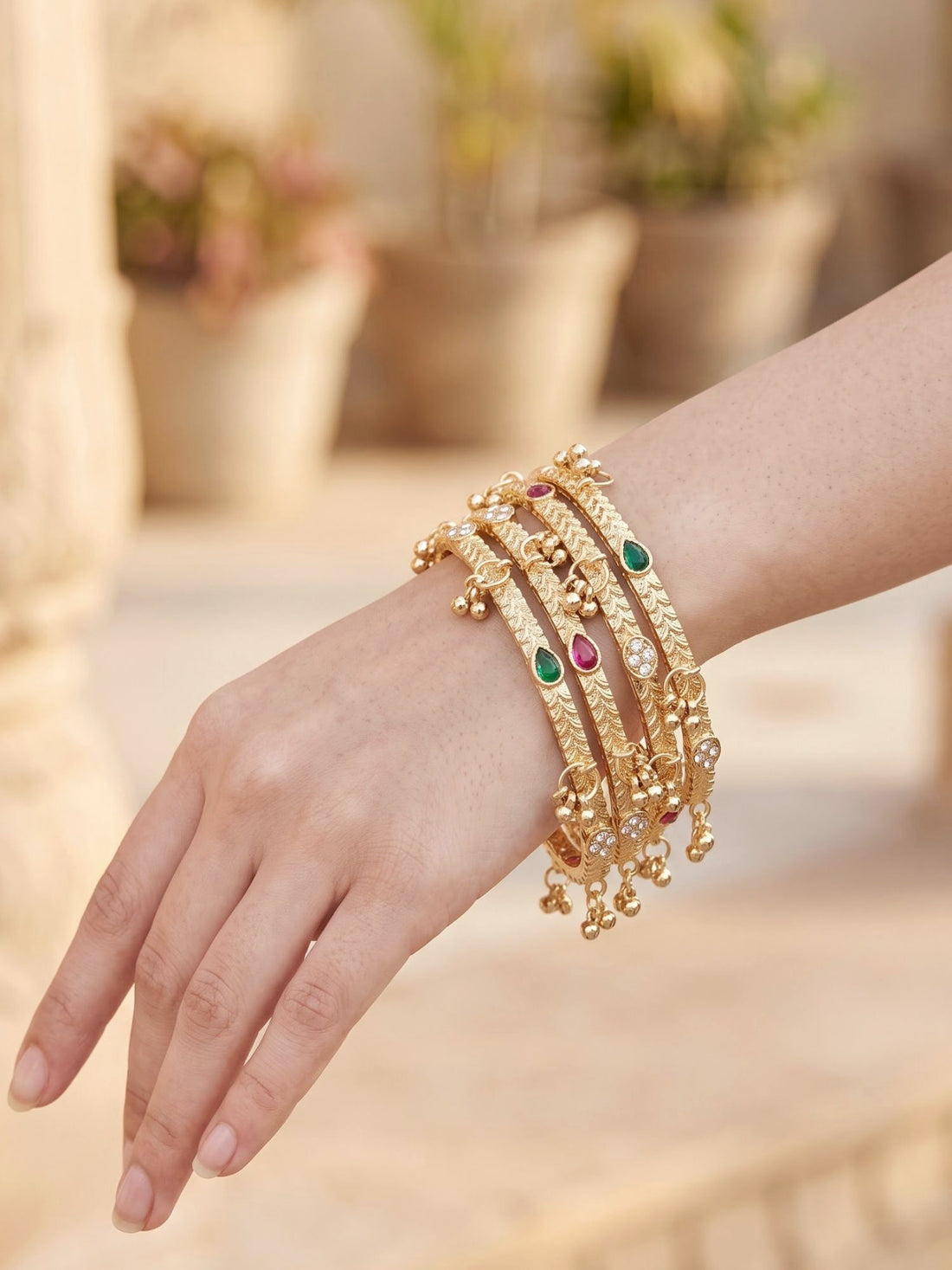 KARATCART Set of 4 Gold-Plated Pink & Green Stone Designer Bangles with Hangings for Women