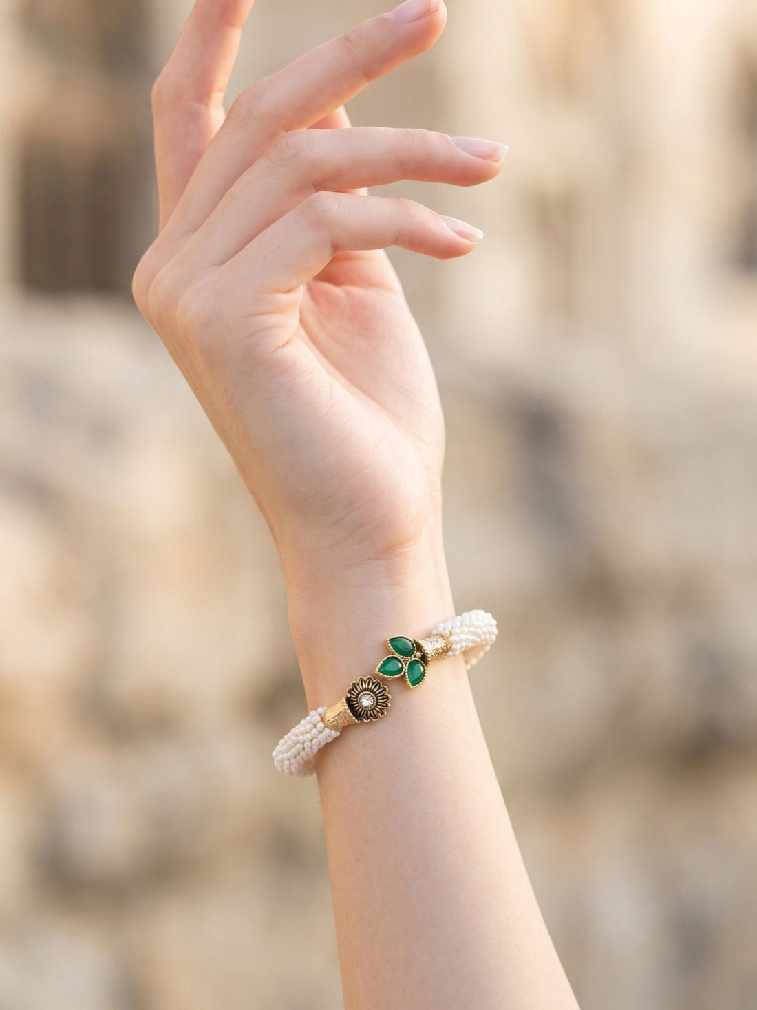 KARATCART Gold-Plated Green Leaf and Pearl Beaded Open Cuff Bracelet for Women