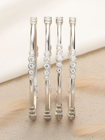 Karatcart Set of 4 Silver Plated Round American Diamond Studded Bangles for Women