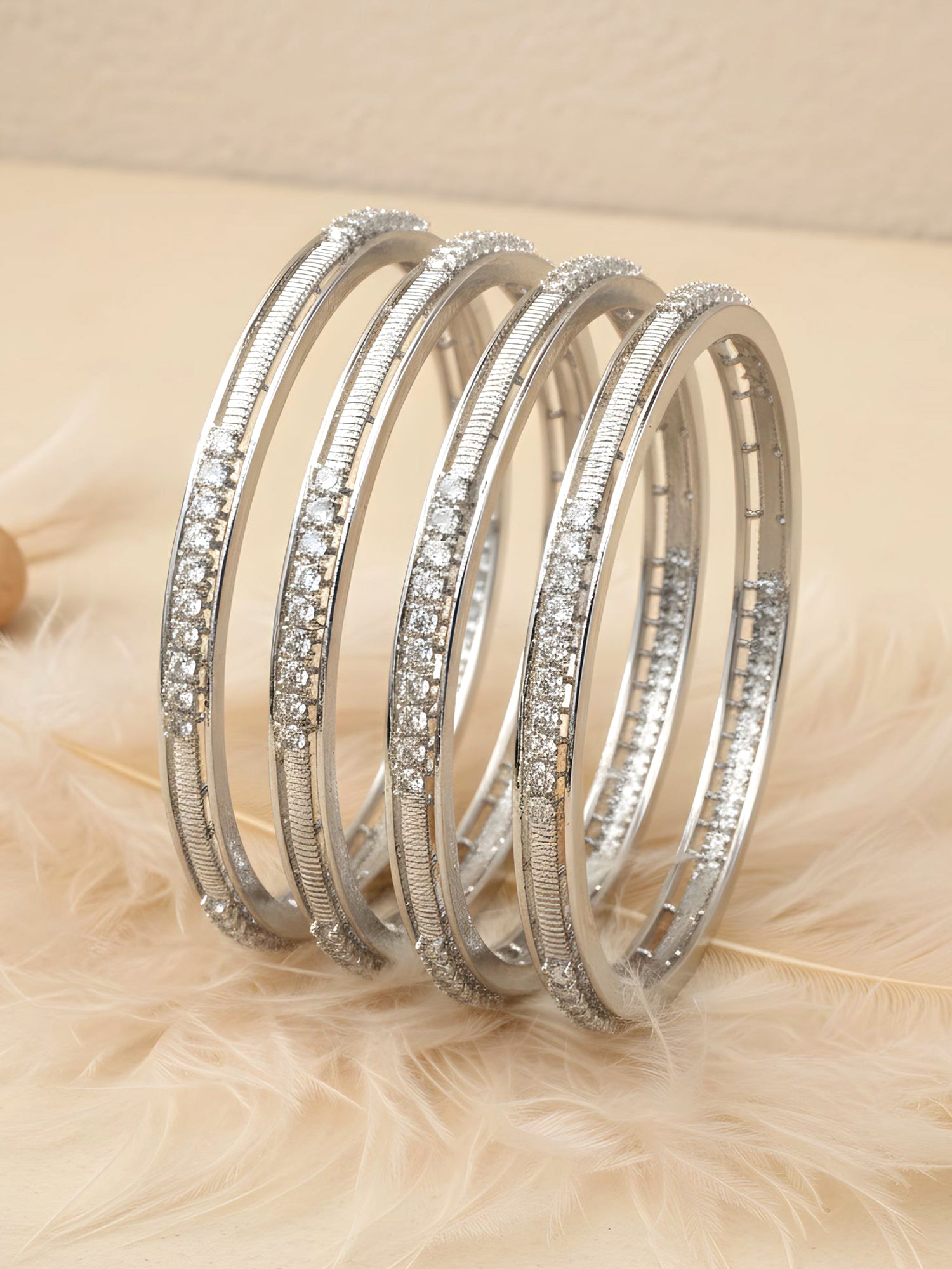 Karatcart Silver Plated Set of 4 American Diamond Studded Bangles for Women