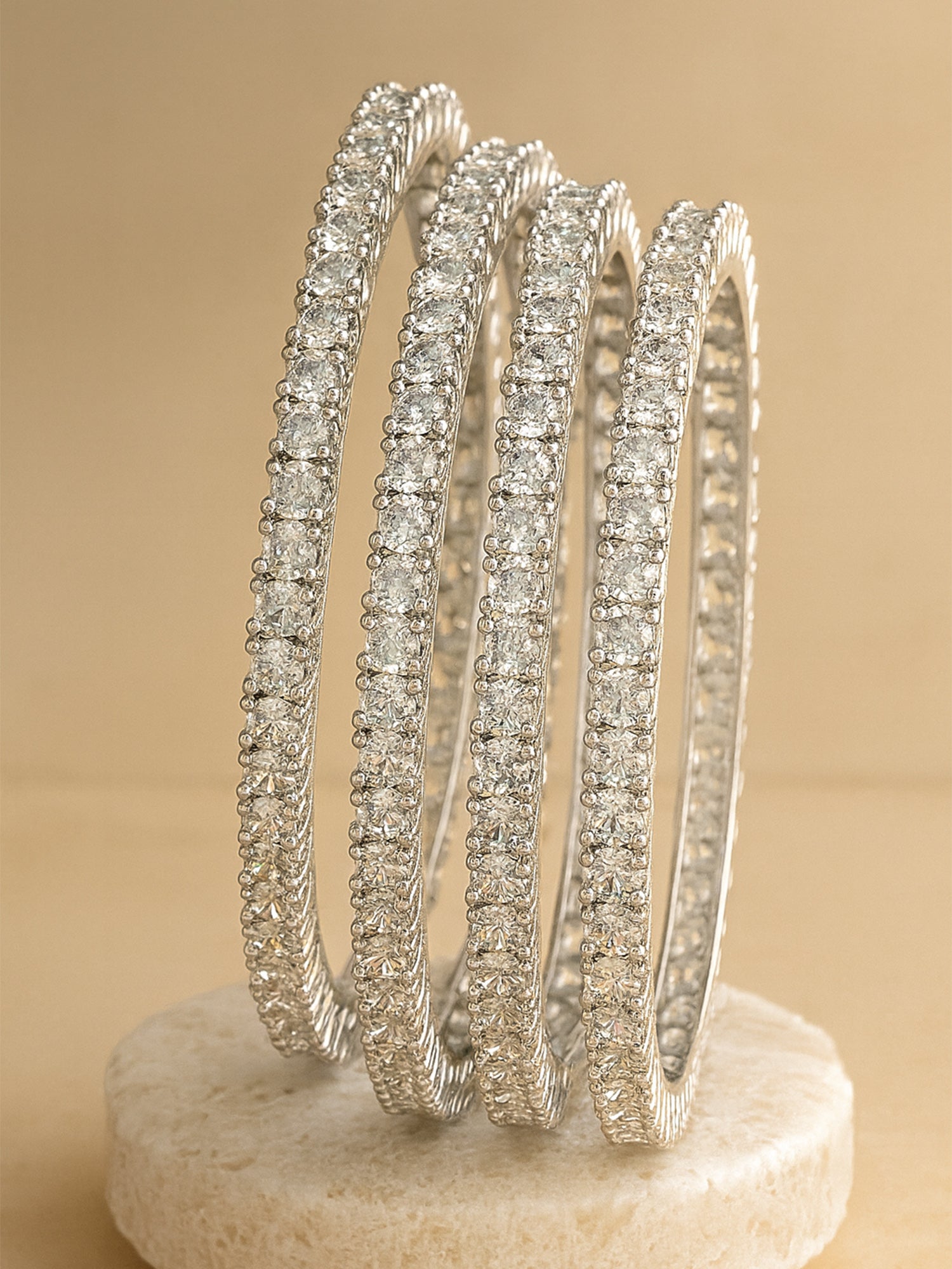 Karatcart Set of 4 Silver Plated Round American Diamond Studded Bangles for Women
