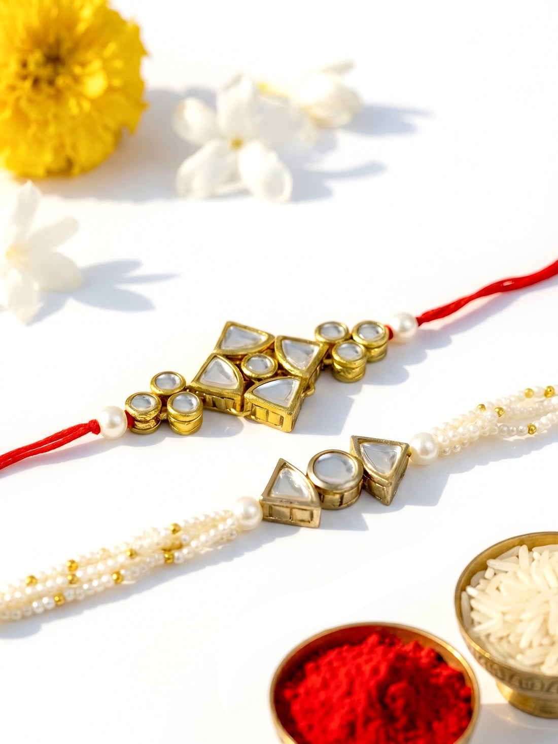 KARATCART Rakhi for Bhai and Bhabhi Set of 2 Gold Plated Handmade Kundan Bhaiya Bhabhi Rakhi Combo with Roli & Chawal