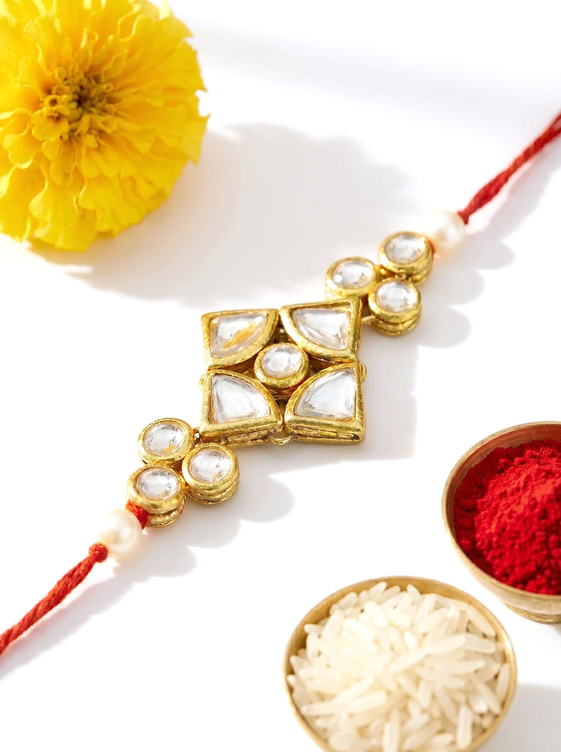 KARATCART Rakhi for Brother Gold-Plated Kundan Rakhi with Roli Chawal