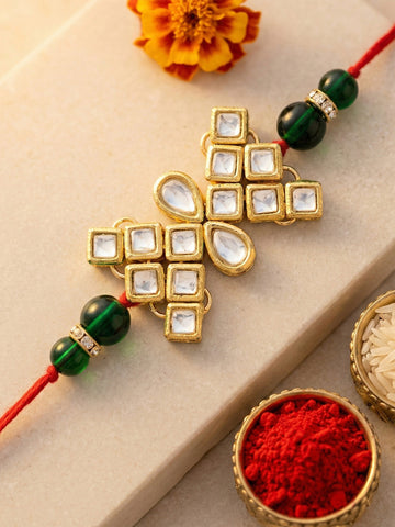 KARATCART Rakhi for Brother Gold-Plated Kundan Rakhi with Roli Chawal