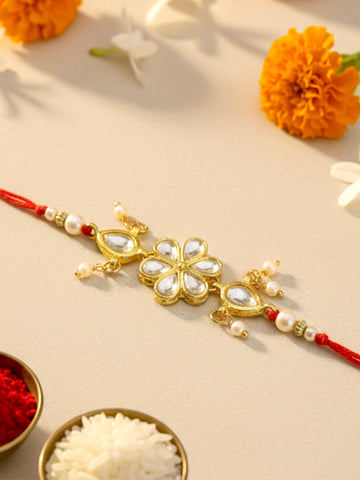 KARATCART Gold-Plated Floral Kundan Rakhi with Roli Chawal for Brother