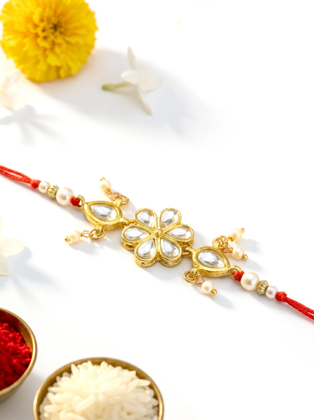 KARATCART Gold-Plated Floral Kundan Rakhi with Roli Chawal for Brother