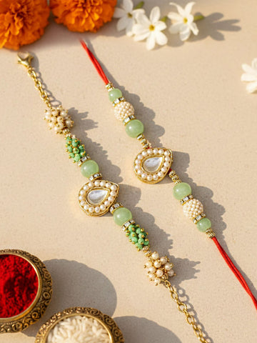 KARATCART Set of 2 Gold Plated Light Green Crystal Kundan Bhaiya Bhabhi Rakhi Combo with Roli & Chawal