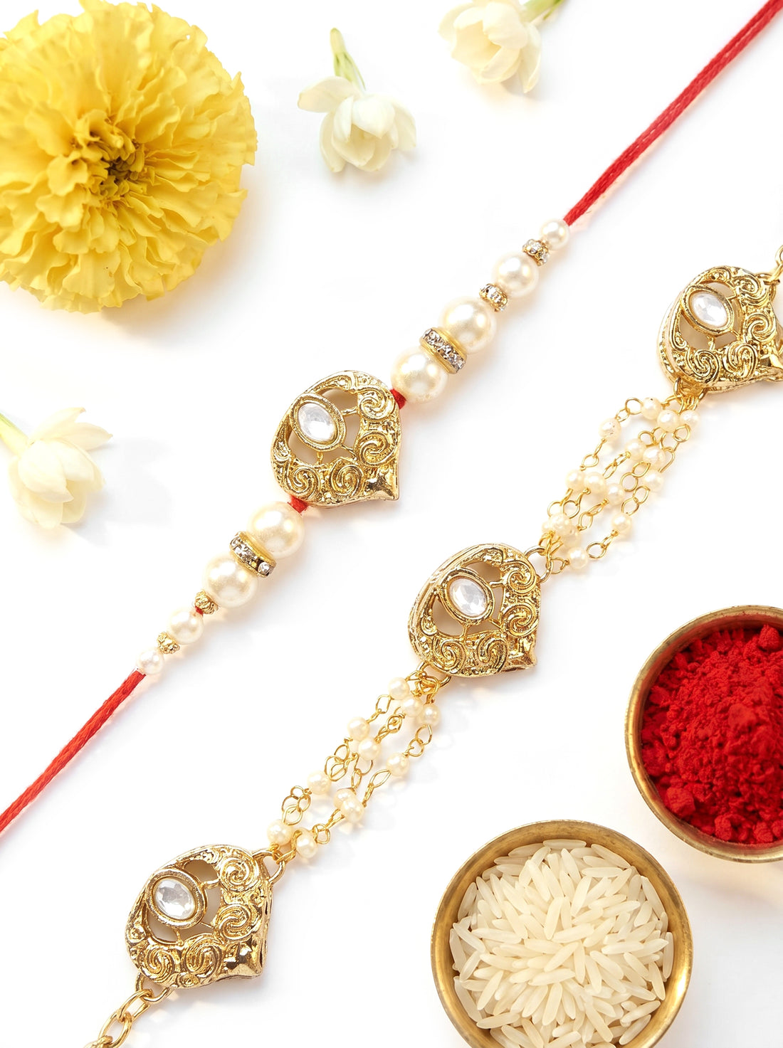 KARATCART Set of 2 Gold Plated Handmade Heart Kundan Bhaiya Bhabhi Rakhi Combo with Roli & Chawal
