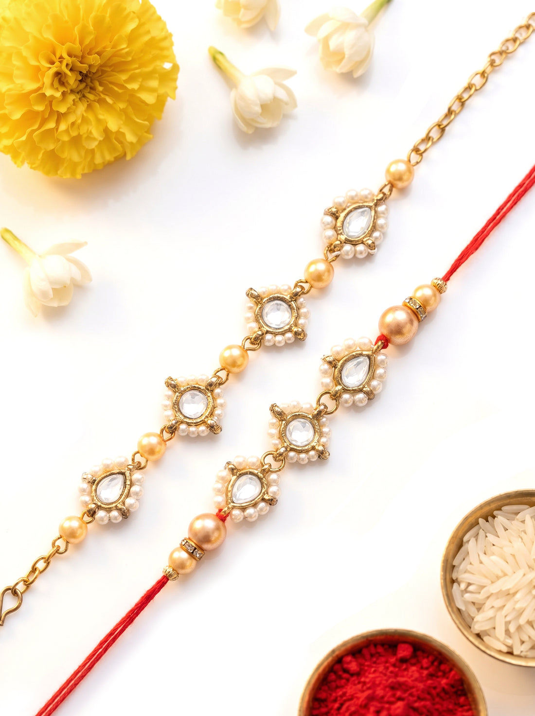 KARATCART Set of 2 Gold Plated Golden Pearl Handmade Kundan Bhaiya Bhabhi Rakhi Combo with Roli & Chawal