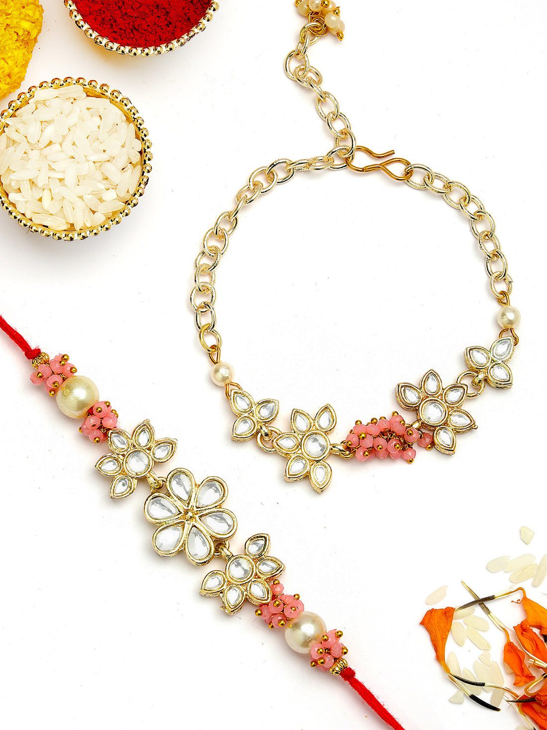 KARATCART Set of 2 Gold Plated Pink Crystal Handmade Kundan Bhaiya Bhabhi Rakhi Combo with Roli & Chawal