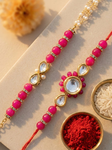 KARATCART Set of 2 Gold Plated Pink Beads Polki Kundan Bhaiya Bhabhi Rakhi Combo with Roli & Chawal