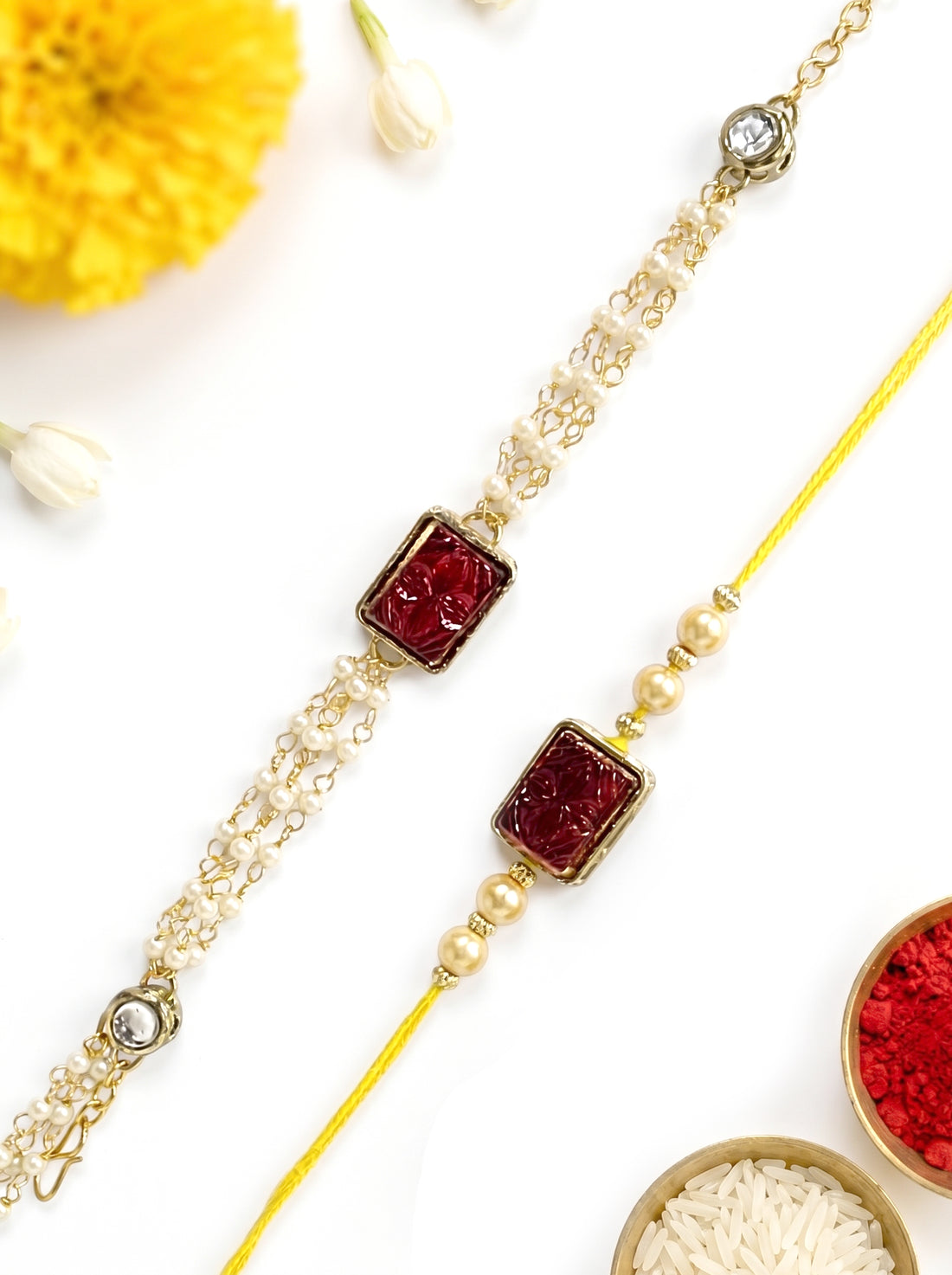 KARATCART Set of 2 Gold Plated Red Carved Stone and Pearl Kundan Bhaiya Bhabhi Rakhi Combo with Roli & Chawal