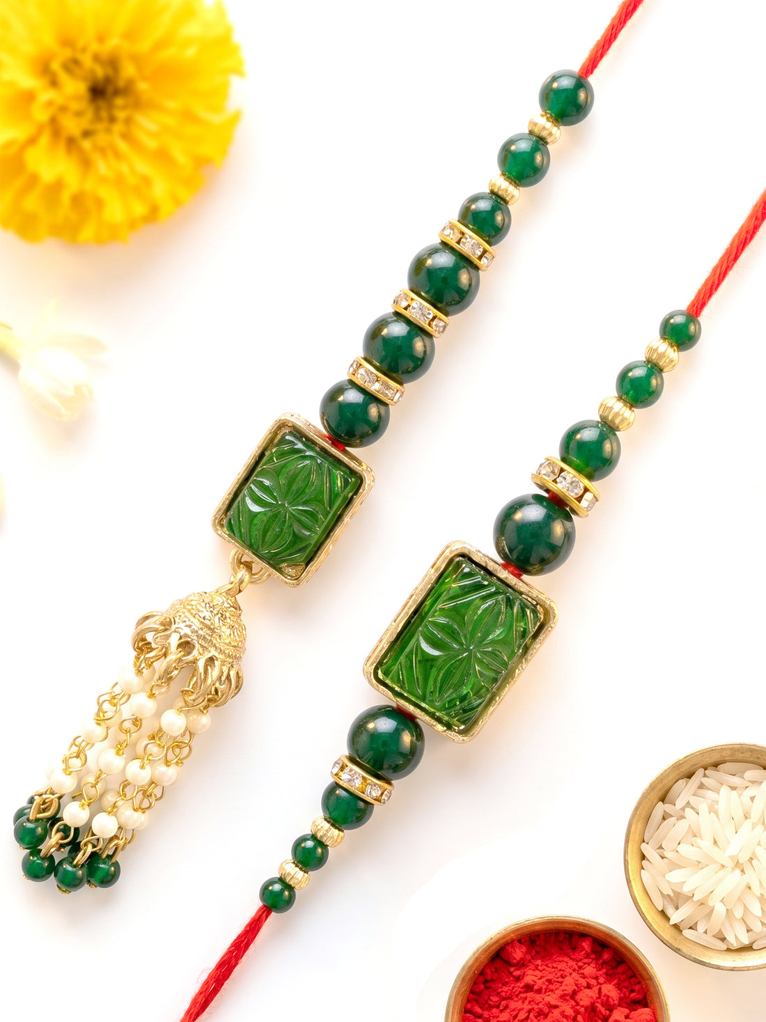 KARATCART Set of 2 Gold Plated Green Carved Stone Kundan Handmade Bhaiya Bhabhi Rakhi Combo with Roli & Chawal