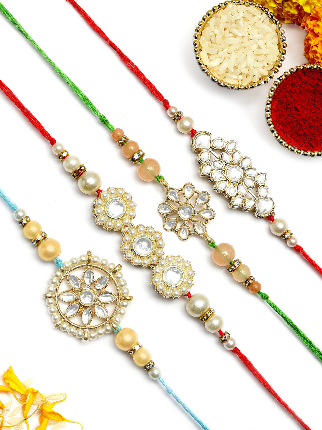 KARATCART Set of 4 Gold Plated Handmade Kundan Rakhi Combo with Roli & Chawal