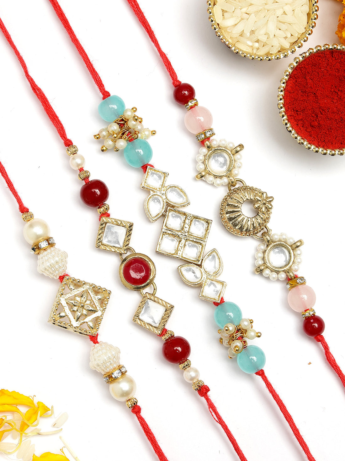 KARATCART Set of 4 Gold Plated Handmade Kundan Rakhi Combo with Roli & Chawal
