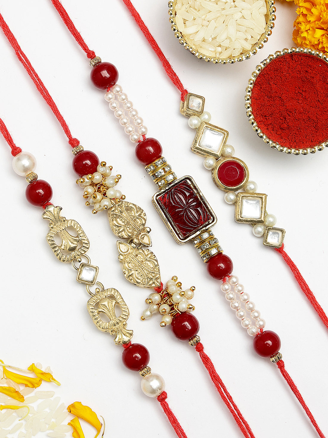 KARATCART Set of 4 Gold Plated Handmade Kundan Rakhi Combo with Roli & Chawal