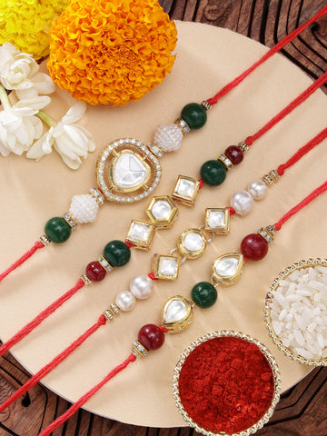 KARATCART Set of 4 Gold Plated Handmade Kundan Rakhi Combo with Roli & Chawal