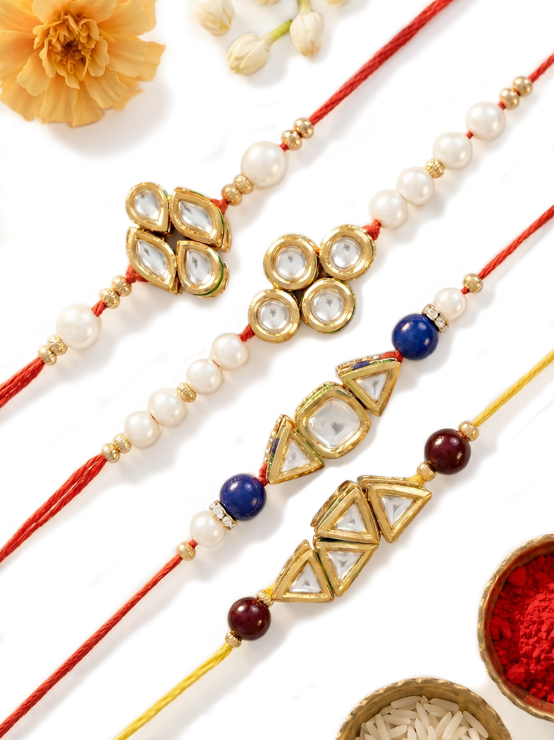 KARATCART Set of 4 Gold Plated Handmade Kundan Rakhi Combo with Roli & Chawal