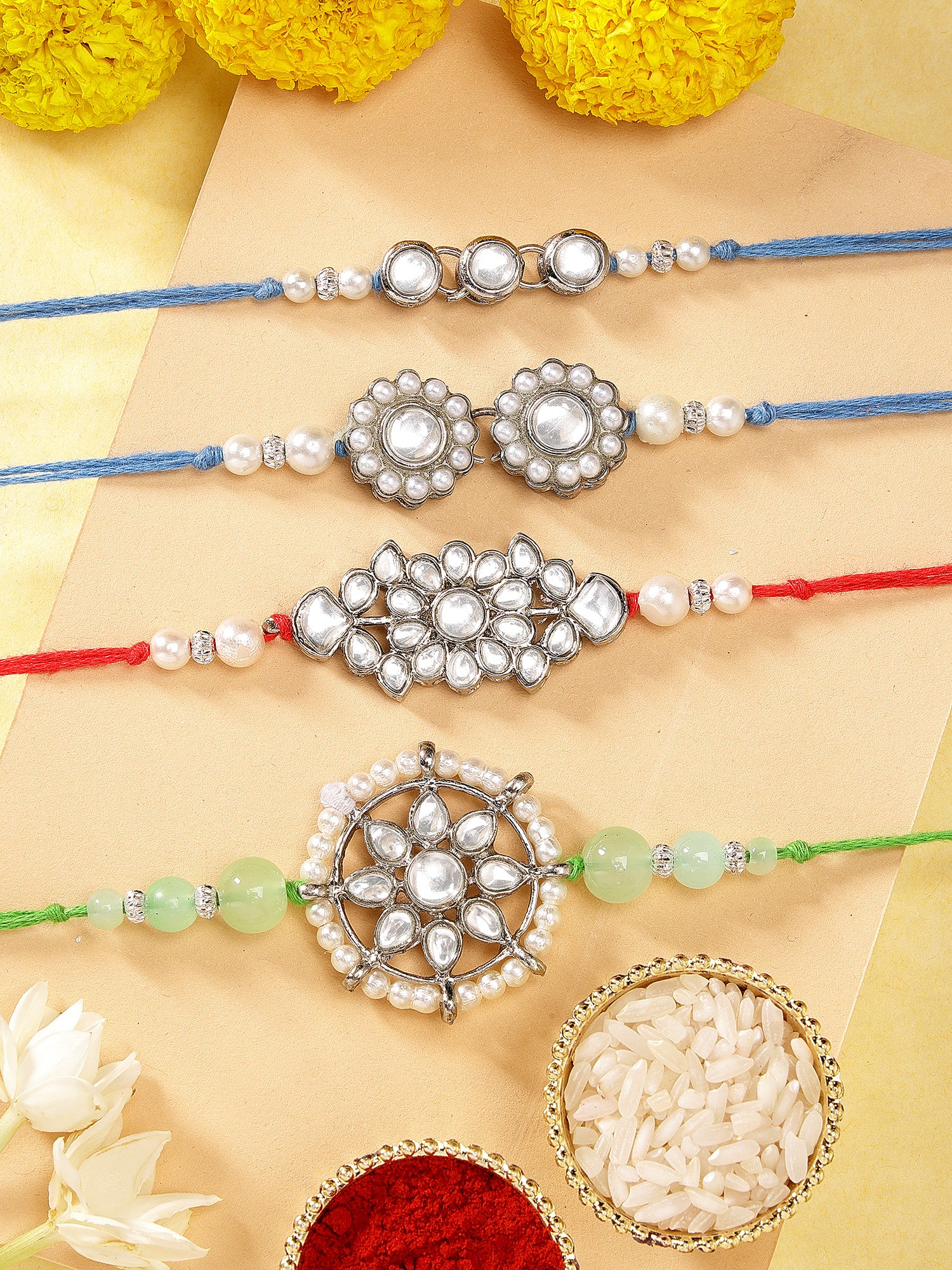 Karatcart Rakhi for Brother Set of 4 Silver Plated Handmade Kundan Rakhi with Roli & Chawal