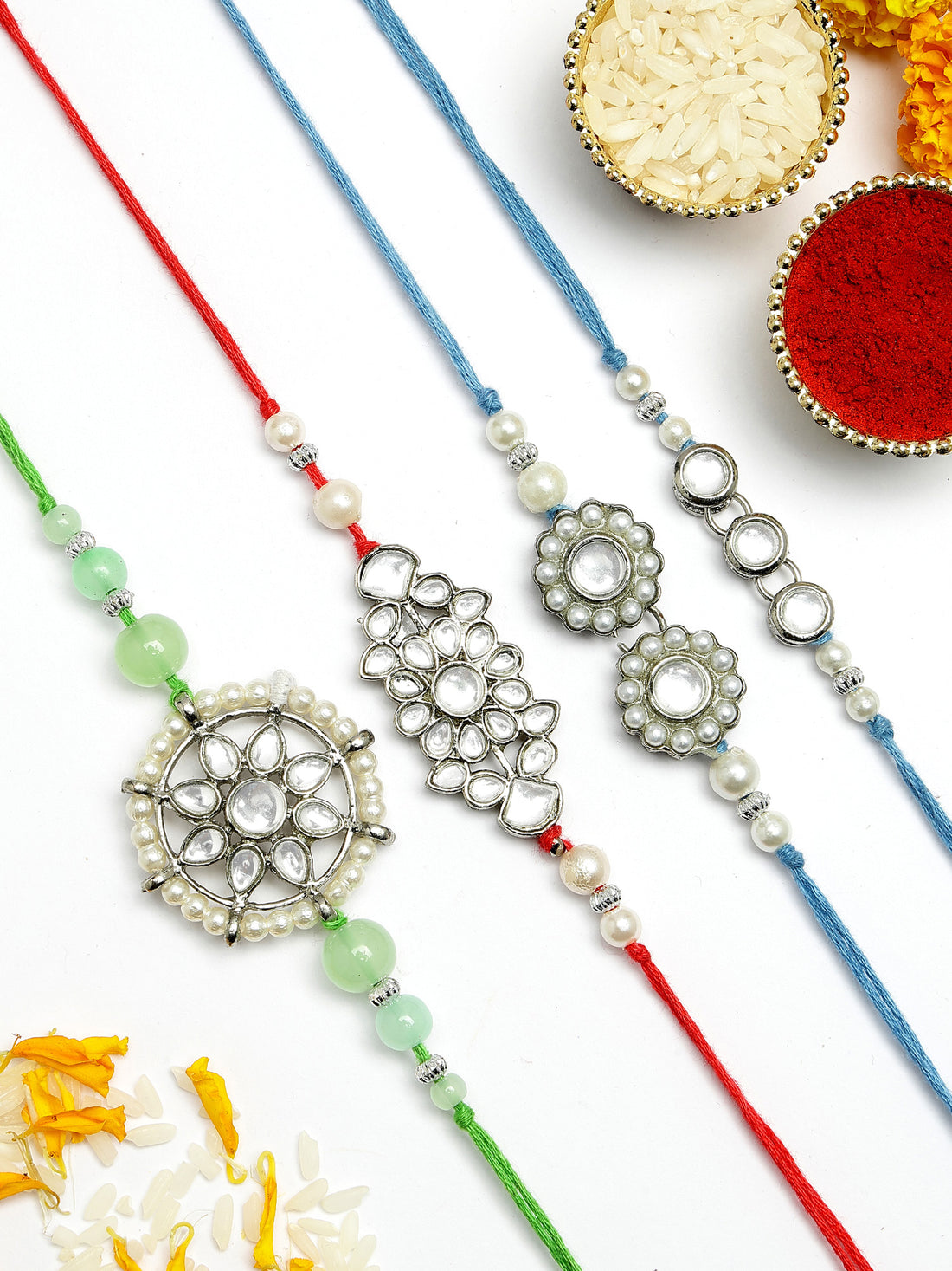 Karatcart Rakhi for Brother Set of 4 Silver Plated Handmade Kundan Rakhi with Roli & Chawal