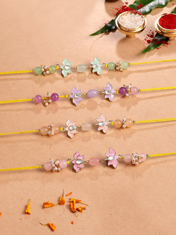 KARATCART Set of 4 Pastel Lotus Enamel Design Kundan Rakhi for Brother with Roli & Chawal