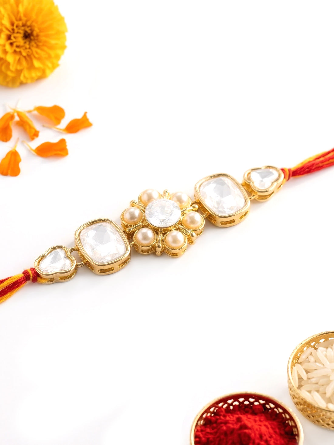 KARATCART Gold Plated Pearl Studded Floral Kundan Bhaiya Rakhi with Roli & Chawal