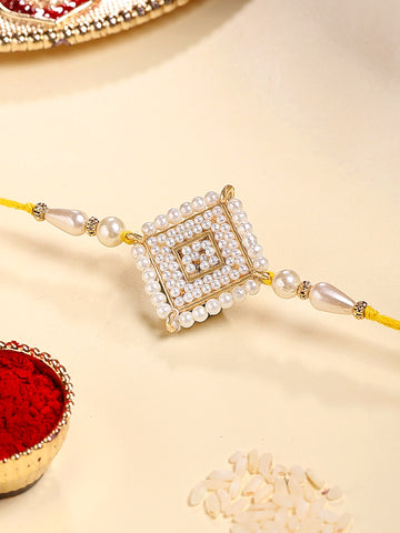 KARATCART Gold Plated White Pearl Studded Floral Kundan Bhaiya Rakhi with Roli & Chawal