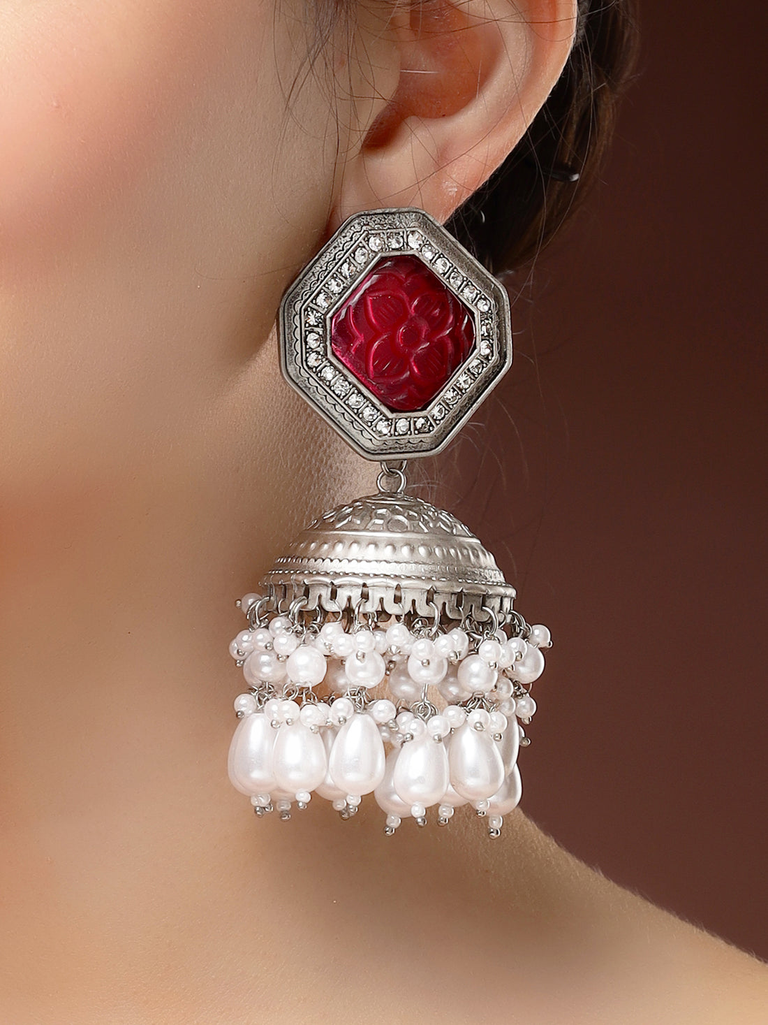 Karatcart Oxidized Silver Red Floral Carved Stone Jhumka Earrings with Drop Pearls