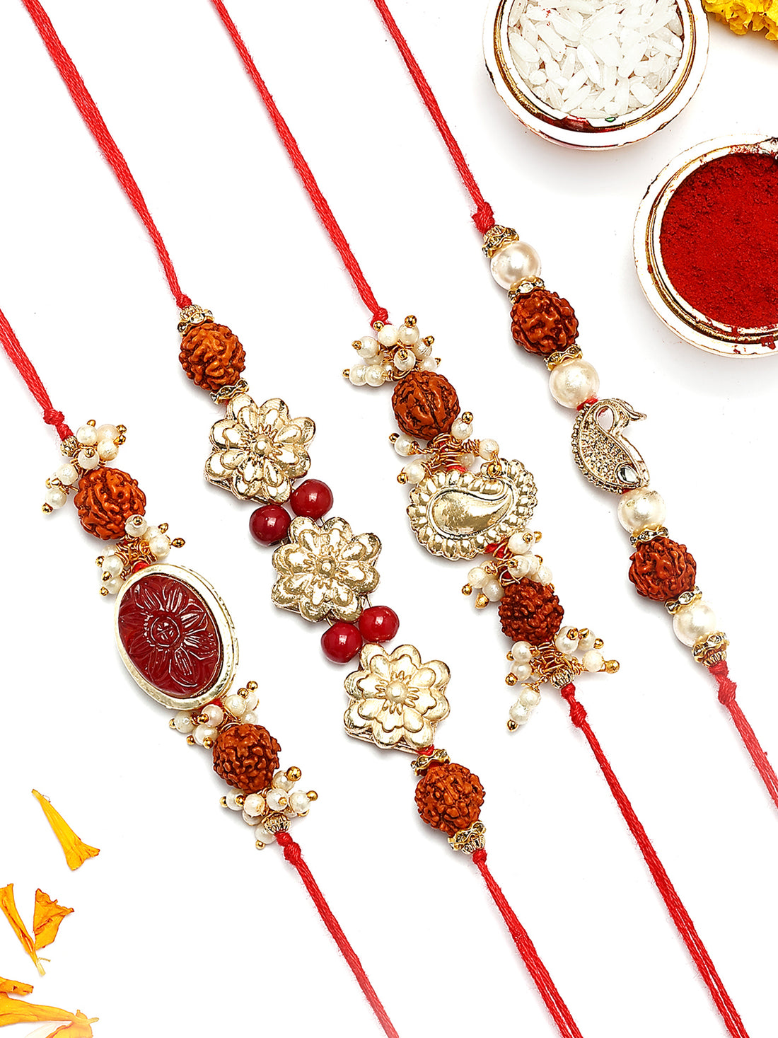 KARATCART Set of 4 Red Carved Stone and Rudraksha Kundan Rakhi for Brother with Roli & Chawal