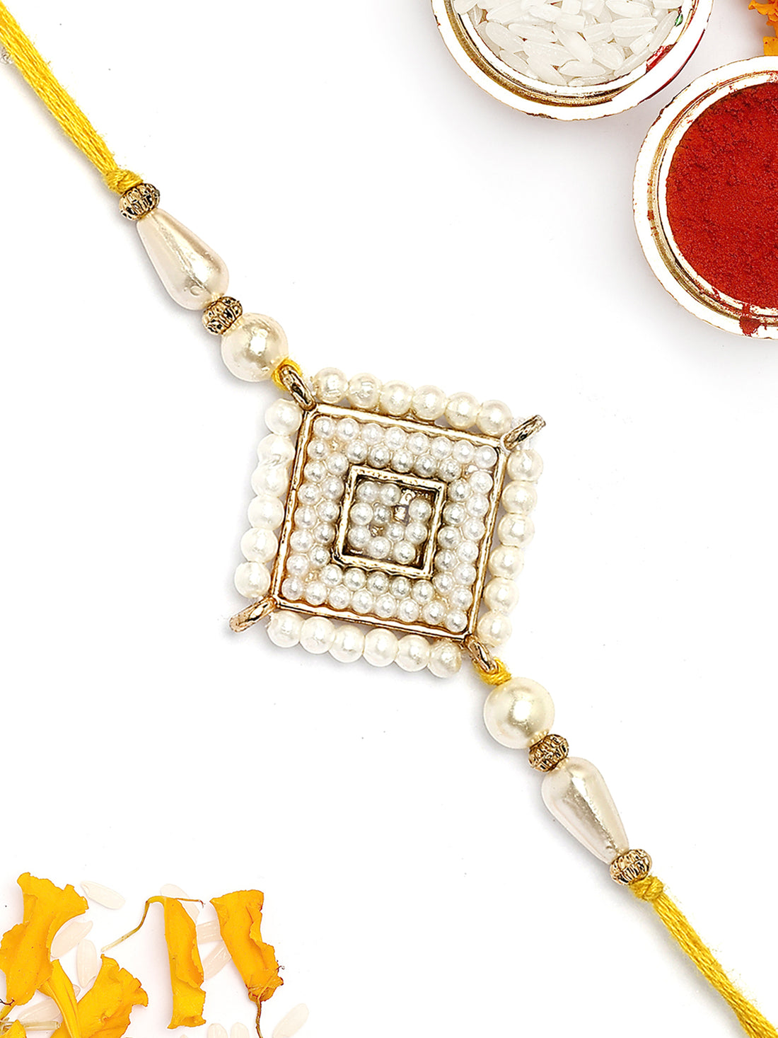 KARATCART Gold Plated White Pearl Studded Floral Kundan Bhaiya Rakhi with Roli & Chawal