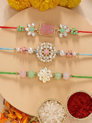 KARATCART Set of 3 Handmade Pink Carved Stone Floral Kundan Rakhis for Brother with Roli & Chawal