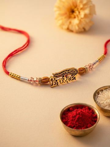 KARATCART Gold Plated Brother Letter with Mor Pankh Designer Bhaiya Rakhi with Roli & Chawal