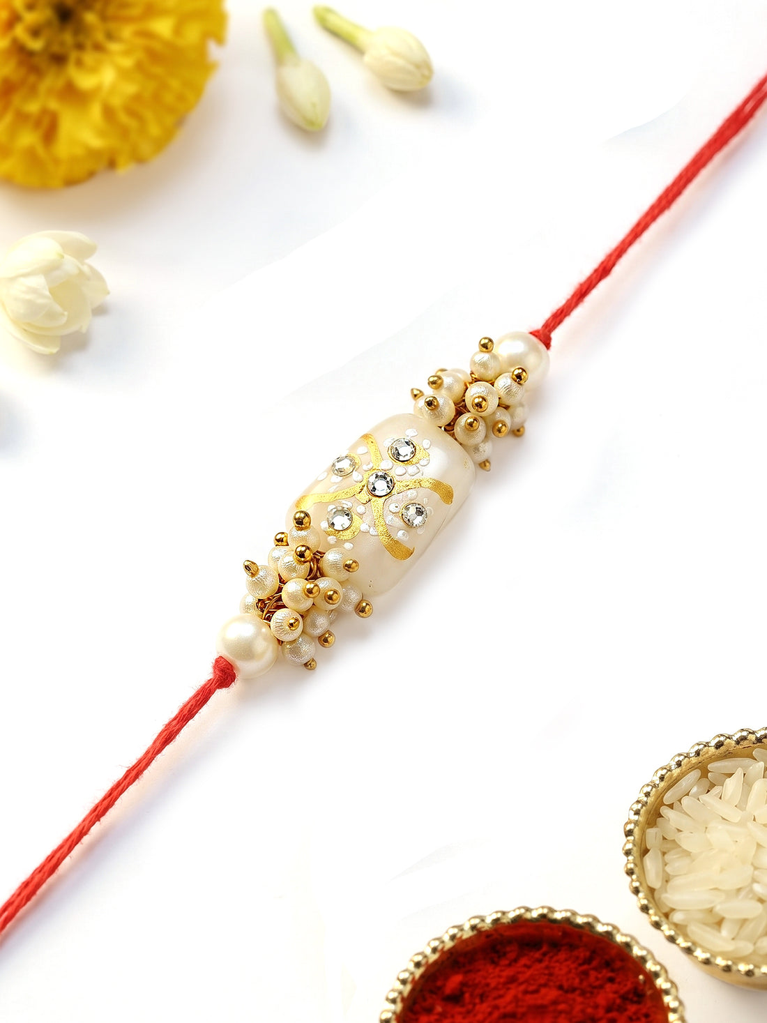 KARATCART Elegant Light Weight White Tumble Rakhi for Brother with Roli Chawal