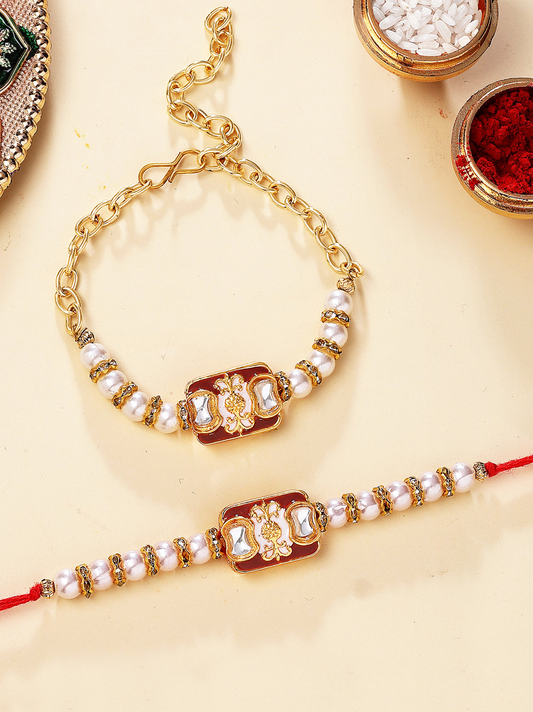Karatcart Gold Plated Brown Enamel and Pearl Kundan Bhiya Bhabhi Rakhi with Roli & Chawal