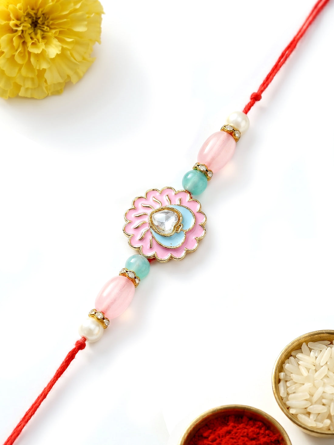 KARATCART Beautiful Pink and Light Blue Floral Meenakari Handmade Rakhi for Brother with Roli Chawal