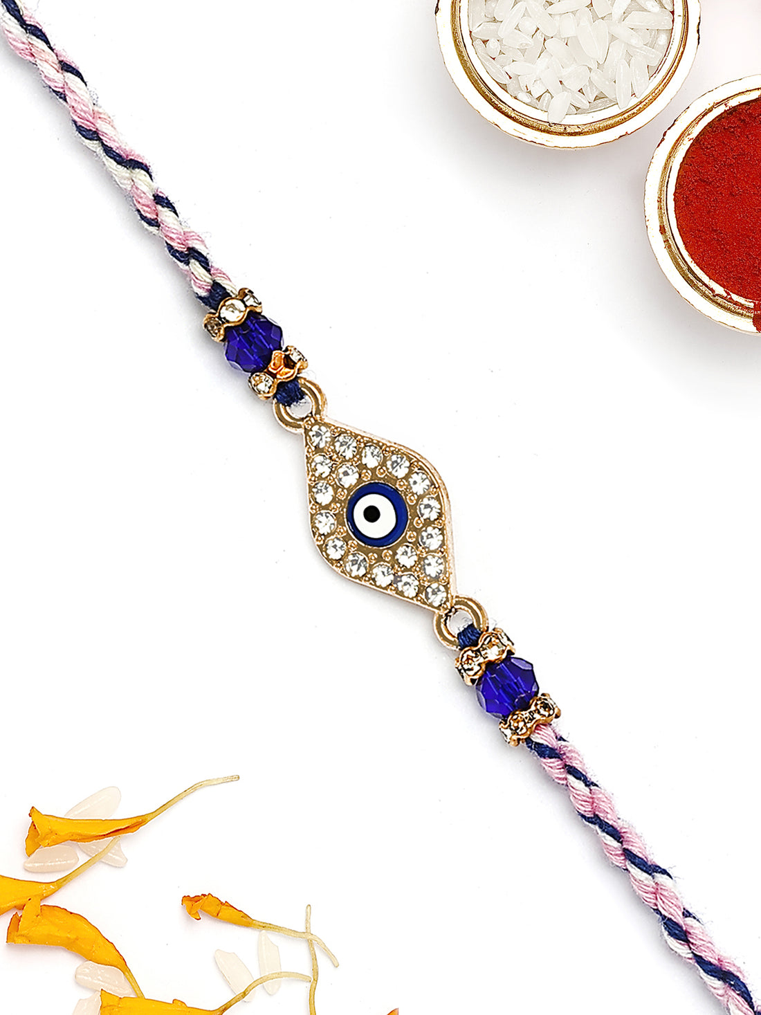 KARATCART Gold Plated Blue American Diamond Evil Eye Bhaiya Rakhi with Roli & Chawal