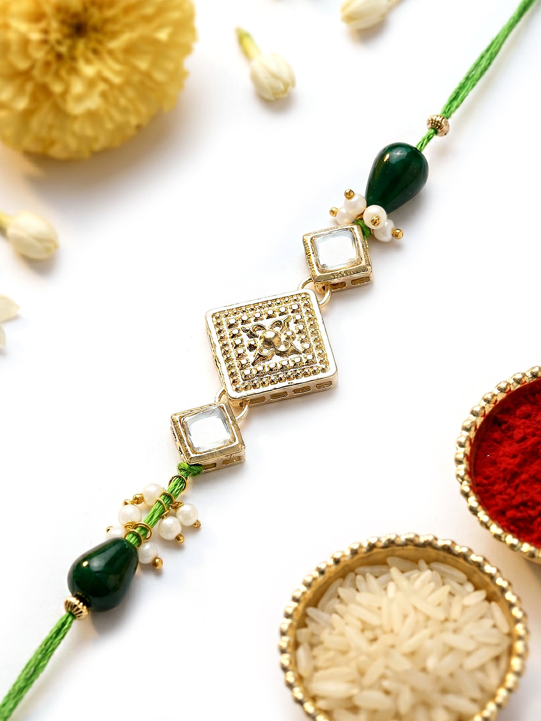 KARATCART Elegant Green Drop Bead Handmade Square Shape Kundan Rakhi for Brother with Roli & Chawal