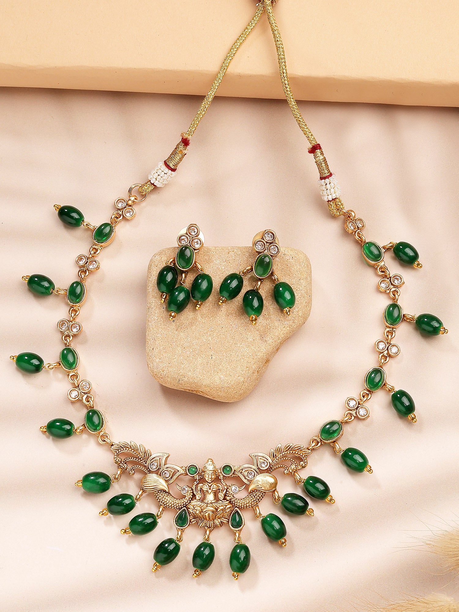 Karatcart Green Tumble Stone Gold Plated Laxmi Mata Temple Jewellery Set for Women