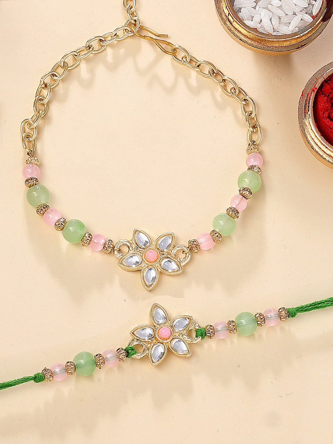 Karatcart Gold Plated Pink and Lime Green Floral Kundan Bhiya Bhabhi Rakhi with Roli & Chawal