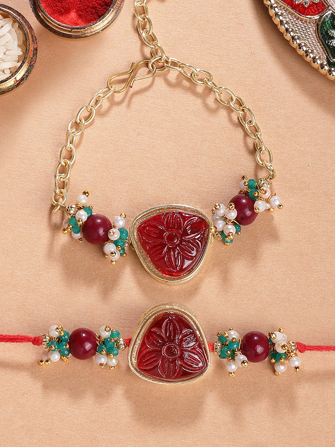 Karatcart Gold Plated Red Carved Stone Kundan Bhiya Bhabhi Rakhi with Roli & Chawal
