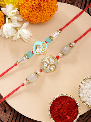 KARATCART Set of 2 Pink and Light Green Handmade Kundan Rakhi for Brother with Roli & Chawal
