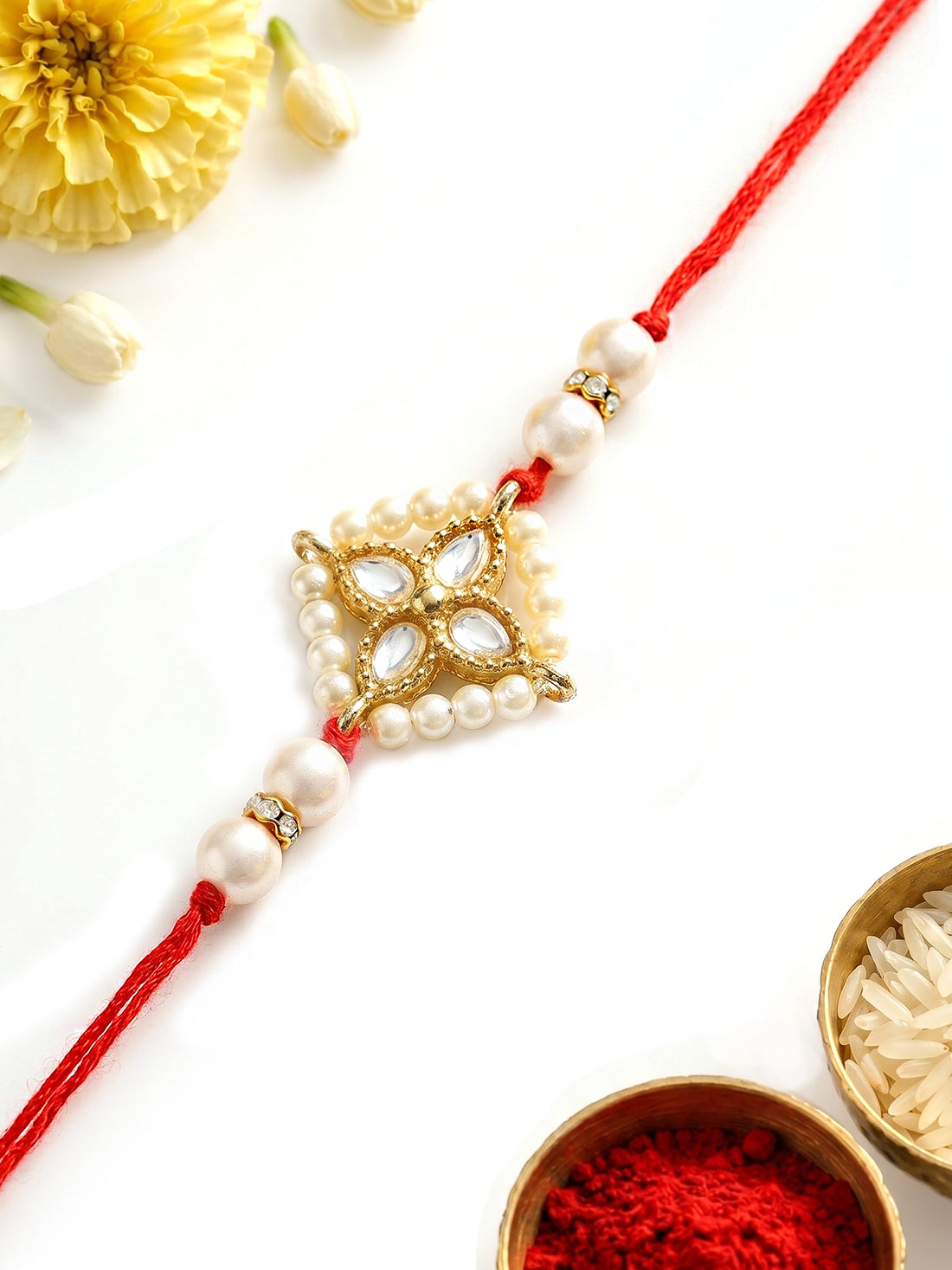KARATCART Traditional Light Weight Floral Design Handmade Kundan Rakhi for Brother with Roli Chawal