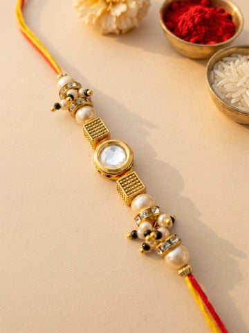KARATCART Gold Plated Polki Kundan and Pearl Bhaiya Rakhi with Roli & Chawal