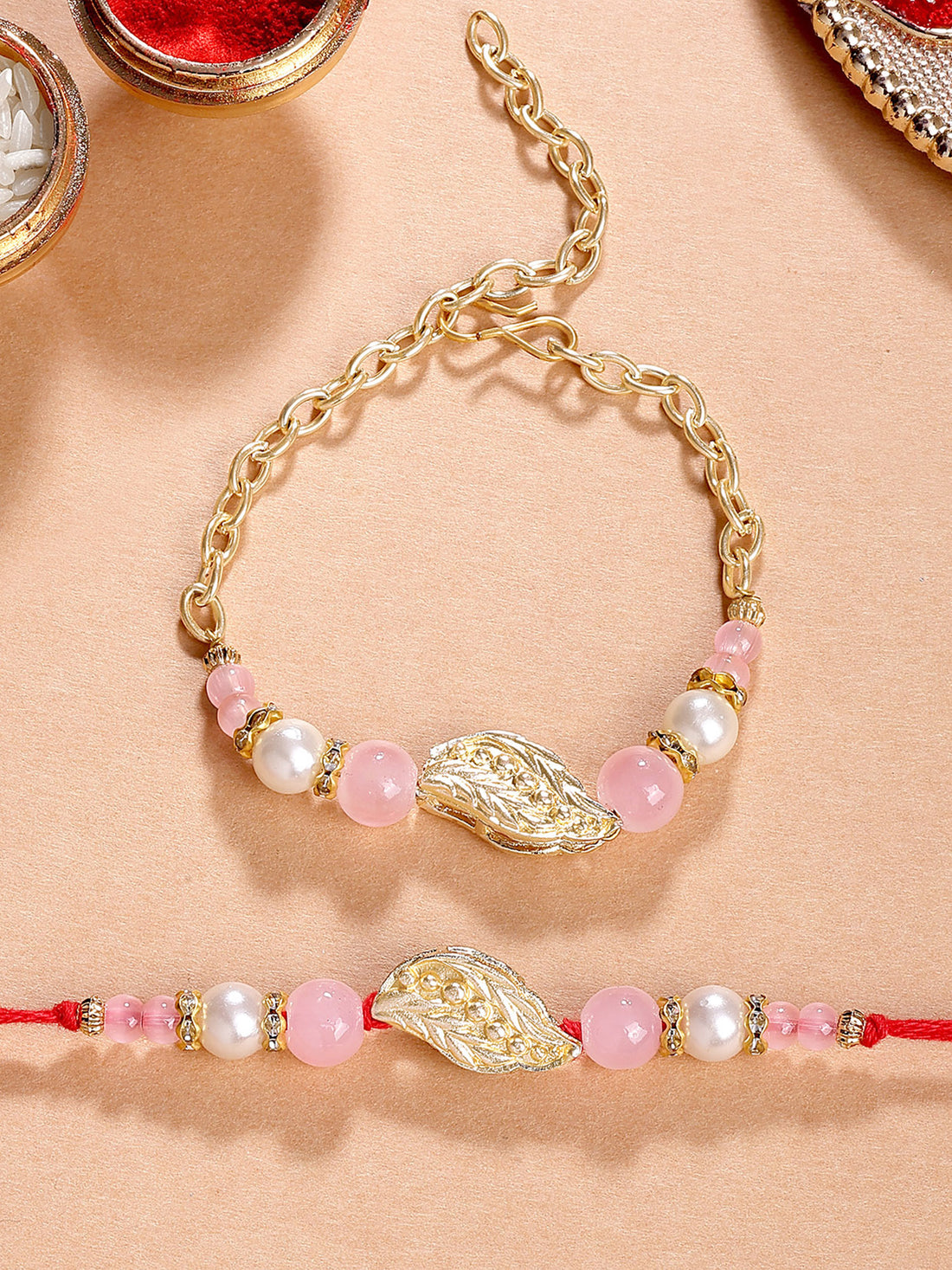 Karatcart Gold Plated Pink Beads Feather Kundan Bhiya Bhabhi Rakhi with Roli & Chawal