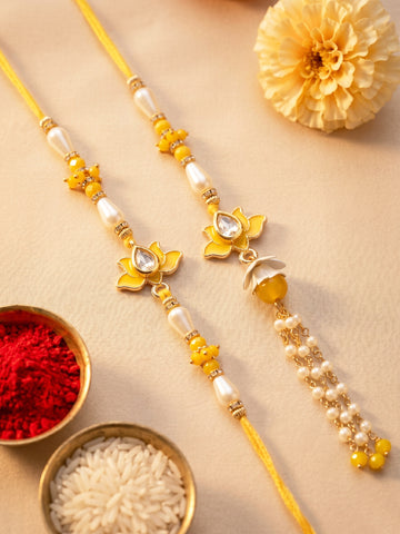 KARATCART Gold Plated Yellow Lotus Floral Kundan Bhaiya Bhabhi Rakhi with Roli & Chawal