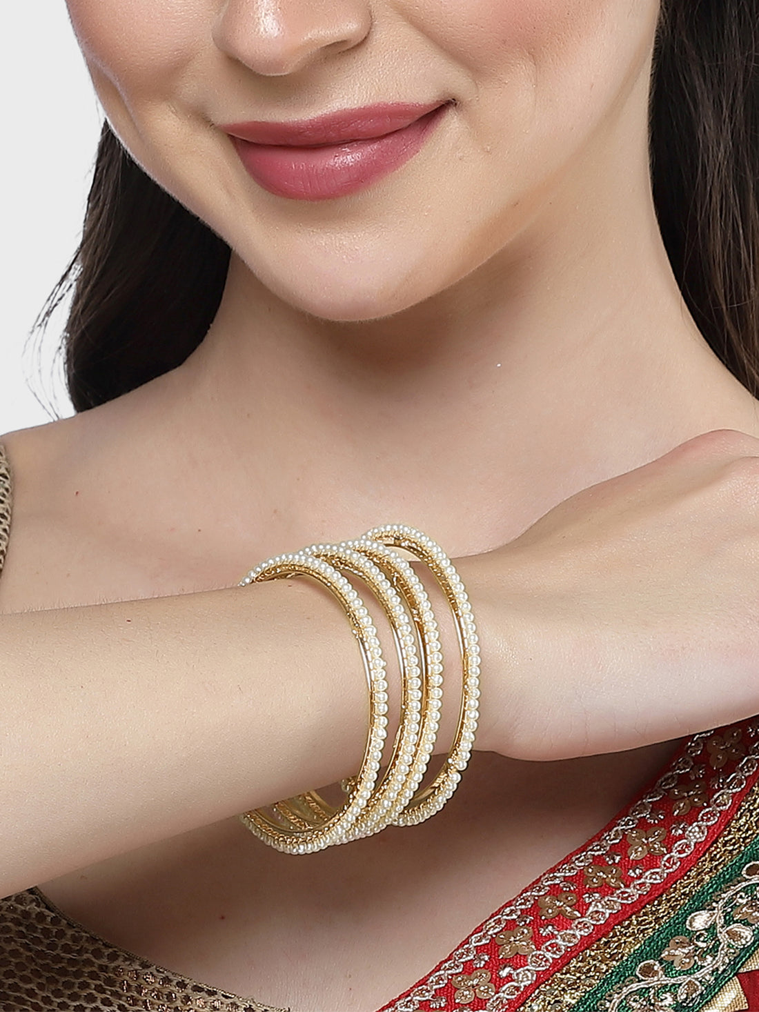 Karatcart Set of 4 Gold-Plated Pearl Studded Bangles for Women