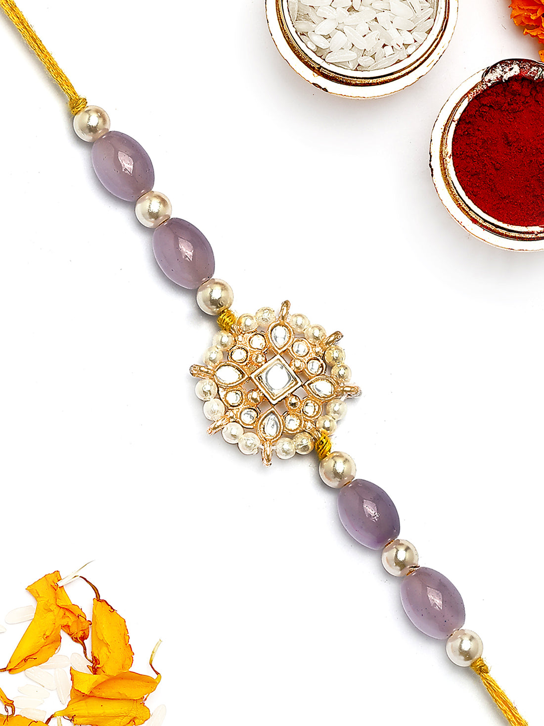 KARATCART Gold Plated Purple Beads Floral Kundan Bhaiya Rakhi with Roli & Chawal