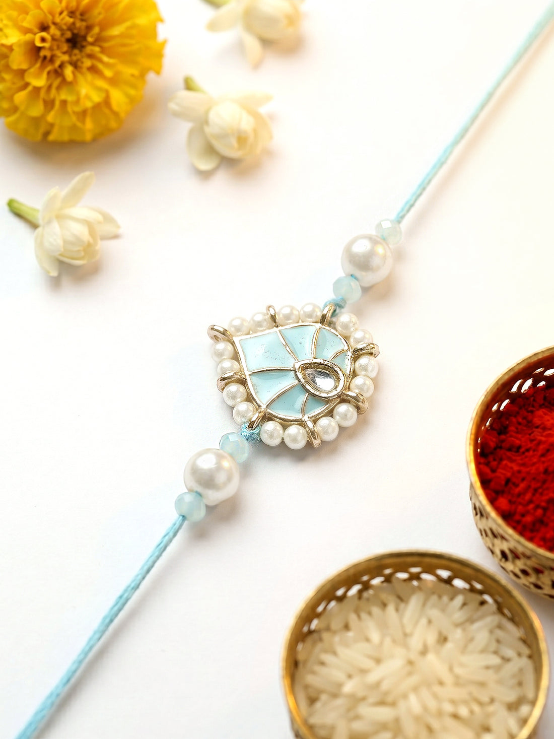 KARATCART Special Blue Meenakari Handmade Heart Shape Kundan Rakhi for Brother with Roli & Chawal